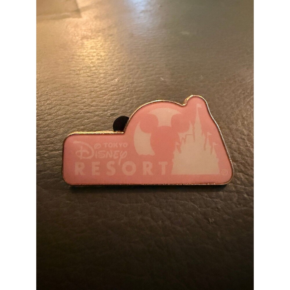 Disney Resort Sakura logo pin featuring a soft pink castle and Mickey